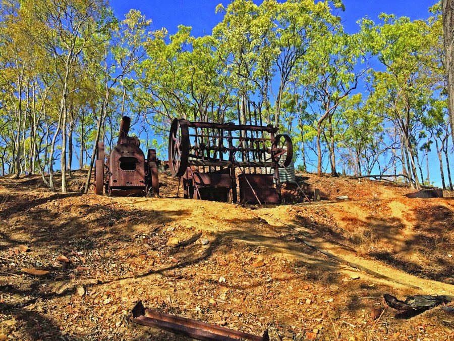 Machinery remains among the trees at the Palmer Goldfield Resources Reserve. This contemporary view brings the story back to the landscape visitors encounter today; it does not show the routes or camps of the 1870s.
